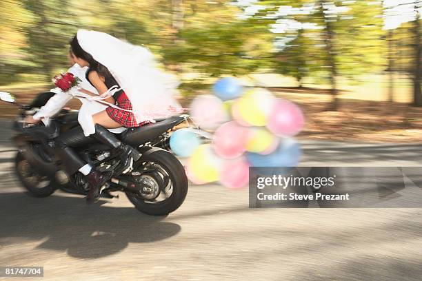 newlyweds on motorcycle - steve prezant stock pictures, royalty-free photos & images