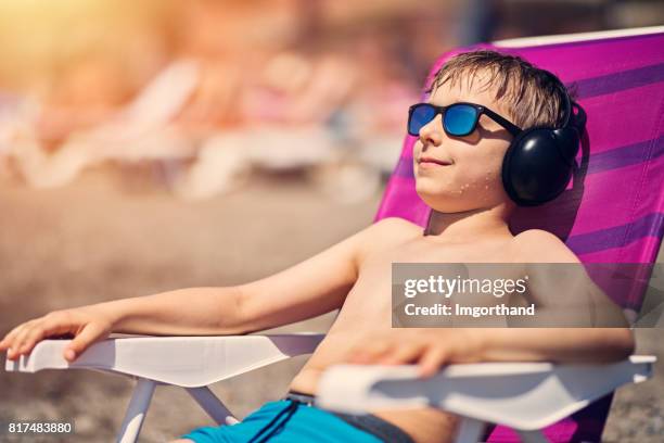 Bot Sunbaking Boy Sunbathing Photos and Premium High Res Pictures - Getty Images