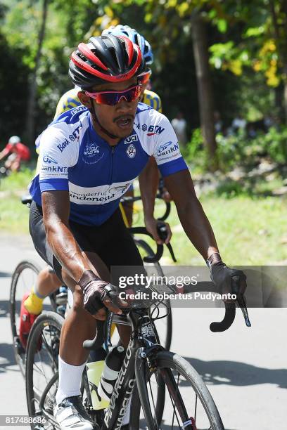 Muh. Imam Arifin of KFC Cycling Team Indonesia competes during the Stage 5 of Tour de Flores 2017, Borong-Ruteng 55.5 km on July 18, 2017 in Ruteng,...