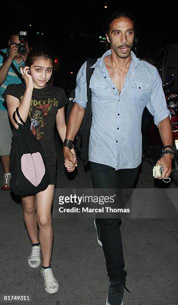 Actor Carlos Leon and daughter Lourdes Ciccone attend Friday night prayers at the Kaballah Center in Manhattan on June 27, 2008 in New York City.