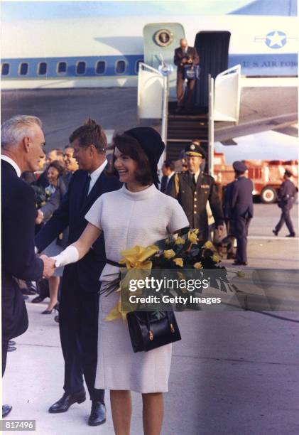 President John F. Kennedy and First Lady, Jacqueline Bouvier Kennedy , arrive at Brooks Air Force Base in San Antonio, Texas, November 21, 1963. The...