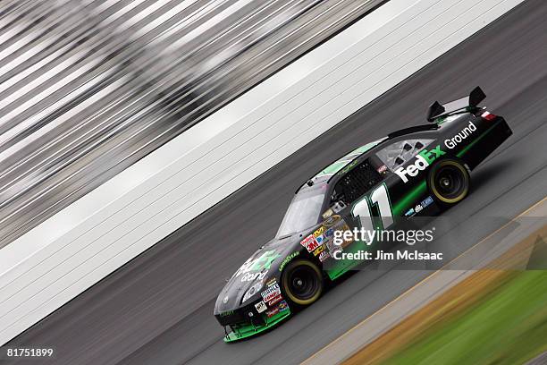 Denny Hamlin, driver of the FedEx Ground Toyota, drives during practice for the NASCAR Sprint Cup Series LENOX Industrial Tools 301 at New Hampshire...