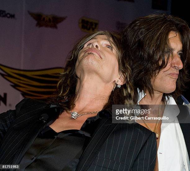 Steven Tyler and Joe Perry attend the launch of Guitar Hero Aerosmith at the Hard Rock Cafe on June 27, 2008 in New York City.