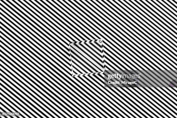 cube prism on black and white stripes illusion - optische illusion stock-fotos und bilder