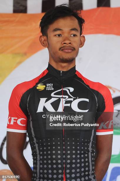 Muh. Imam Arifin of KFC Cycling Team Indonesia celebrates on the podium after taking third position during the Stage 5 of Tour de Flores 2017,...