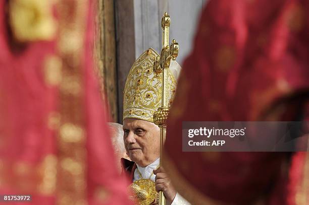 Pope Benedict XVI arrives with the patriarch of the Greek church Bartholomaios I for the St. Paul first Vespers prayer at the Rome's Basilica of St....