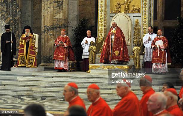 Pope Benedict XVI prays with the patriarch of the Greek church Bartholomaios I during St. Paul first Vespers prayer at the Rome's Basilica of St....