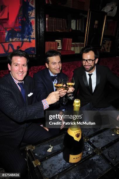 Michael Bruno, Anthony Cenname and Carl Heline attend WSJ. Magazine + The House of Krug Cocktail Reception + Dinner at The Lion NYC on December 14,...