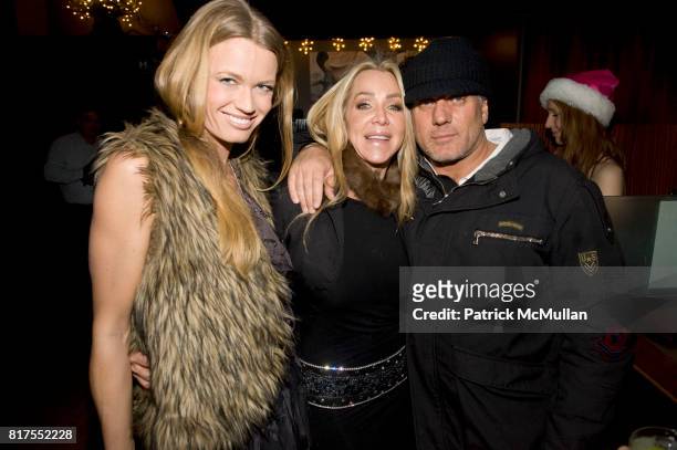 Jennie Norberg, Anna Rothschild and Mark Baker attend Socialite Anna Rothschild's Annual Christmas Party at Velour Lounge on December 14, 2010 in New...