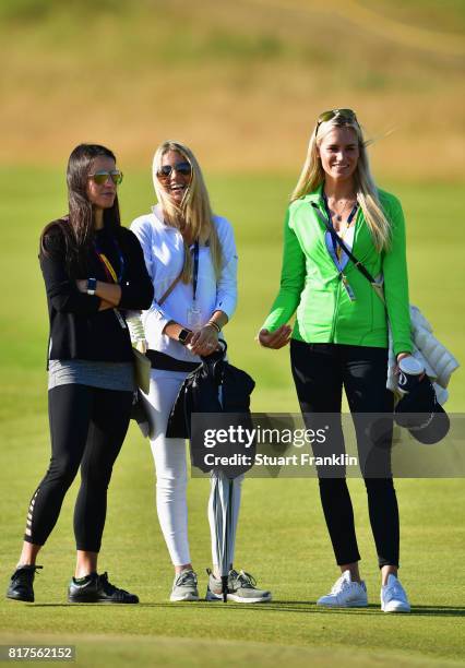 Angela Akins , Gala Ortin and Sofia Lundstedt look on during a practice round prior to the 146th Open Championship at Royal Birkdale on July 18, 2017...