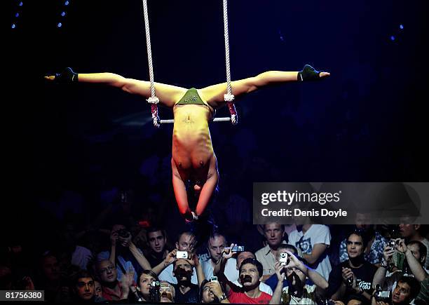 An woman performs on a tightrope during the 16th Barcelona International Erotic Film festival held in the Spanish capital on June 28, 2008 in Madrid,...