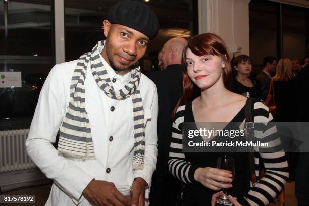 Spooky and Rose Swan attend SLIDE LUCK Auction & Fundraiser Hosted By Patrick McMullan & DJ Spooky at Sandbox Studio on December 8, 2010 in New York.