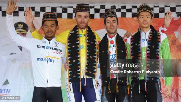 White jersey winner Muh. Imam Arifin of KFC Cycling Team Indonesia, yellow jersey winner Thomas Lebas of Kinan Cycling Team Japan; polkadot jersey...