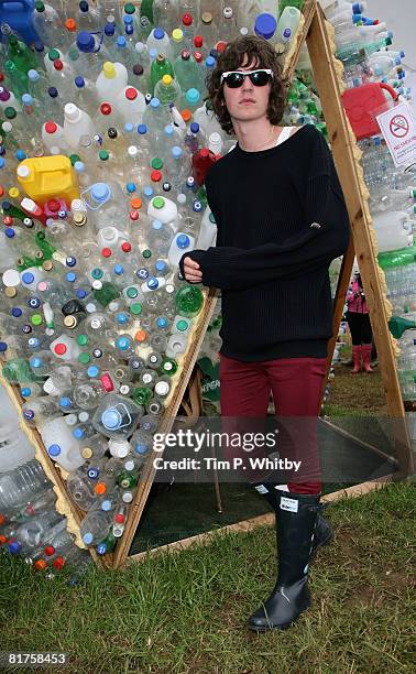 Band member from One Night Only poses backstage at Glastonbury Festival wearing Hunter Wellies in support of the official Glastonbury charity...