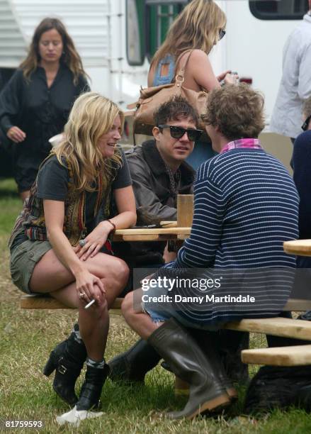 Kate Moss and Jamie Hince at the Glastonbury festival 2008 on June 28, 2008 in Glastonbury, England.