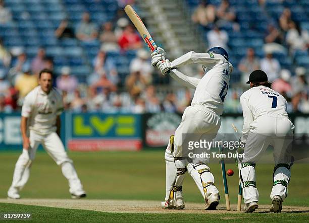 Robin Martin-Jenkins of Sussex is bowled out by Francois Du Plessis of Lancashire during the LV County Championship Division One match between Sussex...