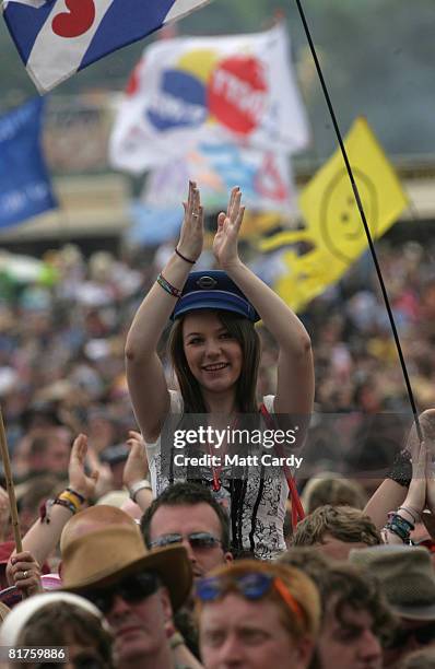 The crowd cheers Newton Faulkner as he performs on the Other Stage Glastonbury Festival at Worthy Farm, Pilton on June 29 2008 in Glastonbury,...