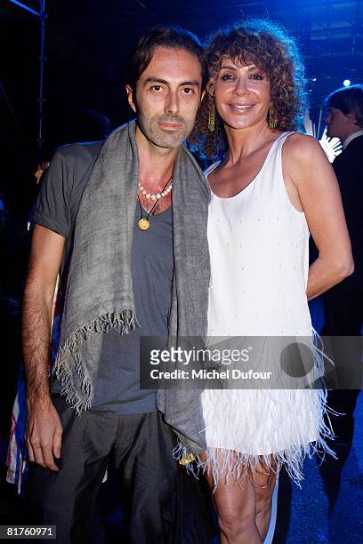 Giambatista Valli and Giannina Facio attend the John Galliano Menswear Spring/Summer 2009fashion show during Paris Fashion Week on June 26, 2008 in...