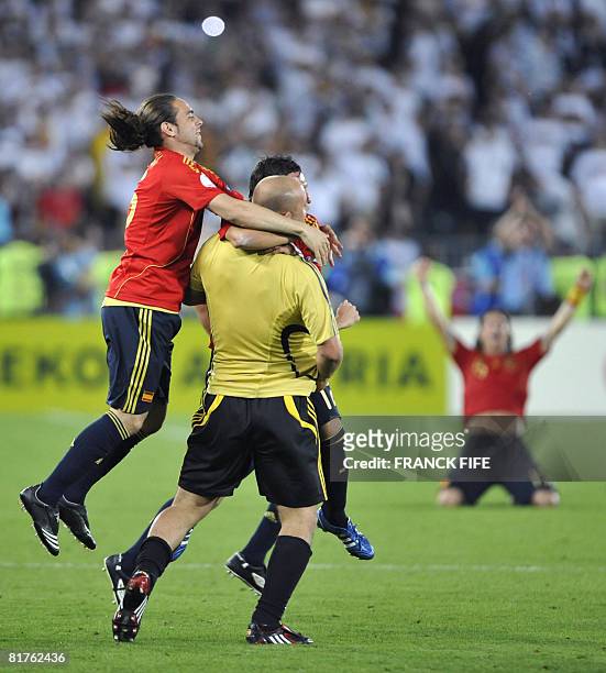 Spanish players Spanish forward Sergio Garcia , Spanish goalkeeper Jose Manuel Reina and Spanish midfielder Santiago Cazorla celebrate after the Euro...