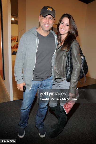 Phillip Levine and Ashley Turchin attend ART BASEL MIAMI BEACH 2010 at Miami Beach Convention Center on December 1, 2010 in Miami Beach, Florida.