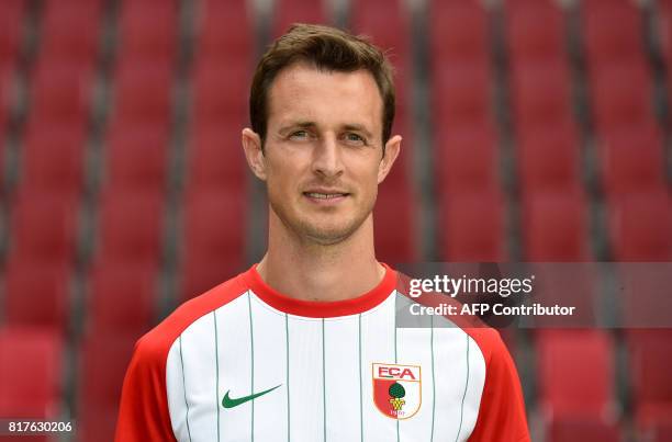 Augsburg's defender Christoph Janker poses during a team presentation of the German first division Bundesliga football team FC Augsburg in Augsburg,...