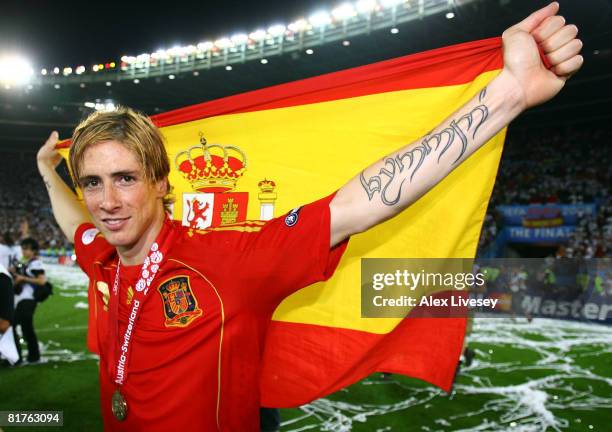 Fernando Torres of Spain holds the national flag after the UEFA EURO 2008 Final match between Germany and Spain at Ernst Happel Stadion on June 29,...