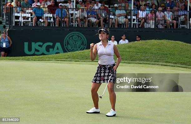 Maria Jose Uribe of Colombia holes her final putt at the 18th hole to secure the 'low amateur' gold medal during the final round of the 2008 US...