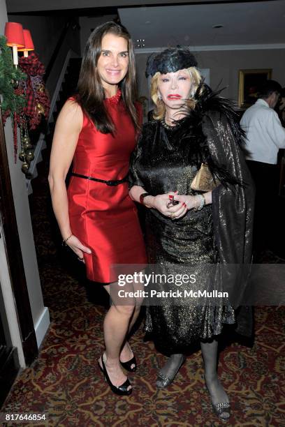 Brooke Shields and Monique van Vooren attend ANNE HEARST MCINERNEY, JAY MCINERNEY and GEORGE FARIAS Holiday Party at 21 Club on December 16, 2010 in...