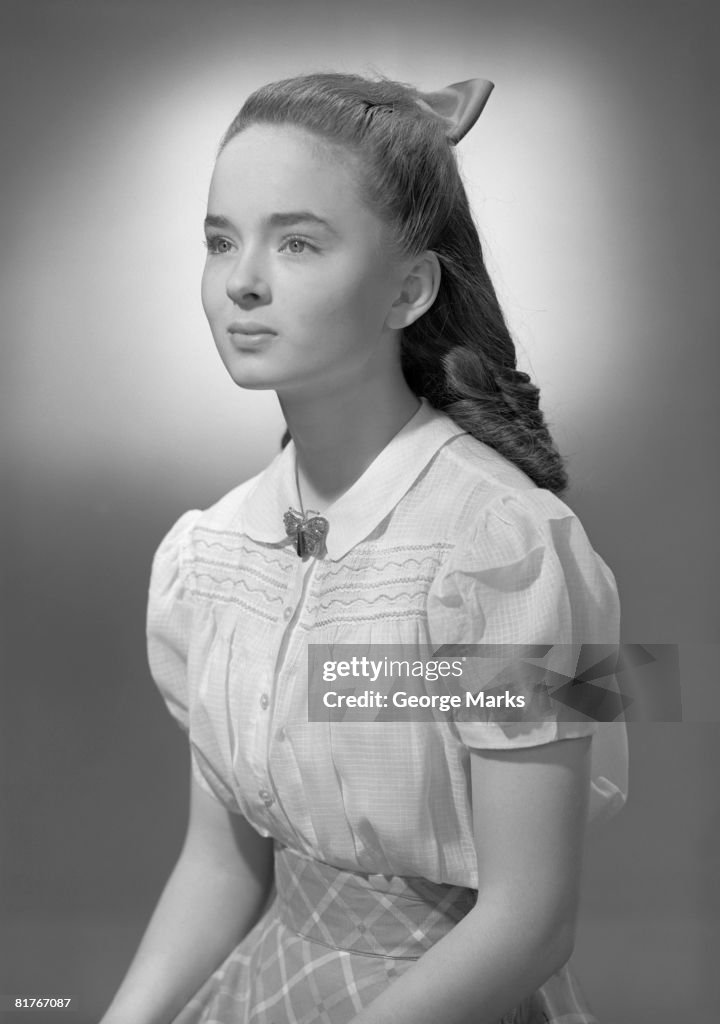 Studio shot of teenage girl (14-15)