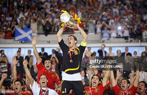 Spanish goalkeeper Iker Casillas holds the Euro 2008 championships trophy after Spain won the final football match over Germany on June 29, 2008 at...