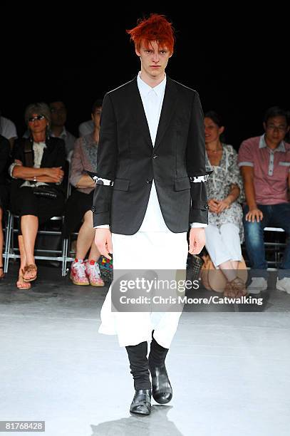 Model walks the runway wearing the Comme Des Garcon Homme Plus Menswear Spring Summer 2009 collection during Paris Fashion Week on June 27,2008 in...