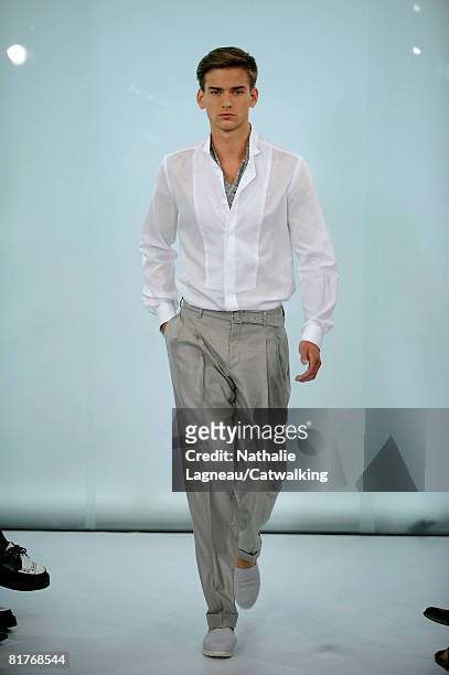 Model walks the runway wearing the Cerruti Menswear Spring Summer 2009 collection during Paris Fashion Week on June 27,2008 in Paris,France.