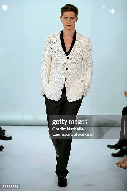 Model walks the runway wearing the Cerruti Menswear Spring Summer 2009 collection during Paris Fashion Week on June 27,2008 in Paris,France.