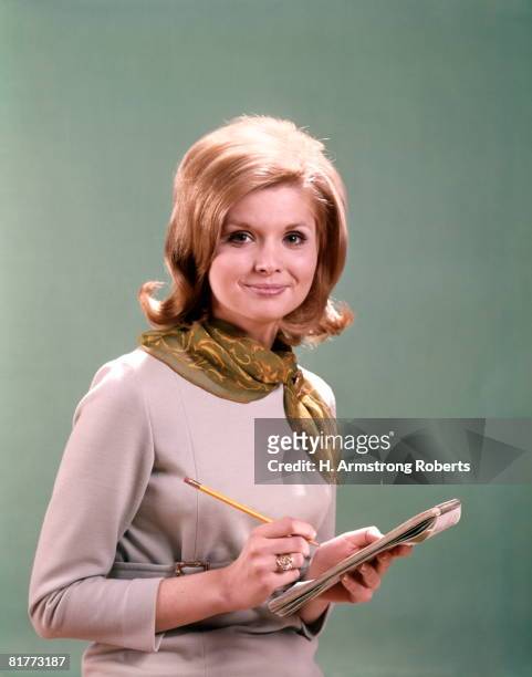 woman stenographer secretary with pencil and notepad for dictation. - großes halstuch stock-fotos und bilder