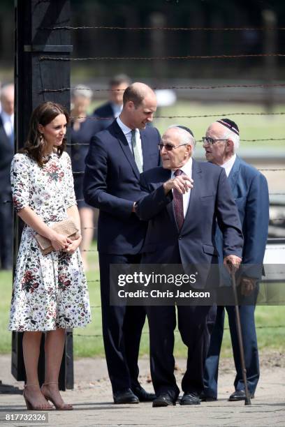 Prince William, Duke of Cambridge and Catherine, Duchess of Cambridge talk with former prisoners from the Stutthof concentration camp during an...