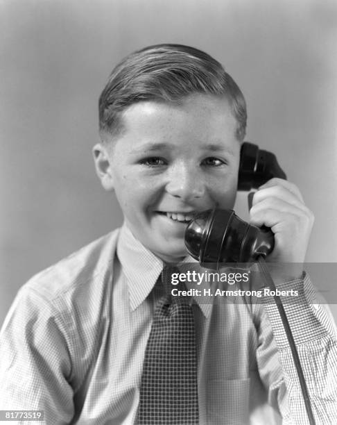 freckle faced boy smiling, talking on phone while wearing shirt and tie. - freckle faced - fotografias e filmes do acervo