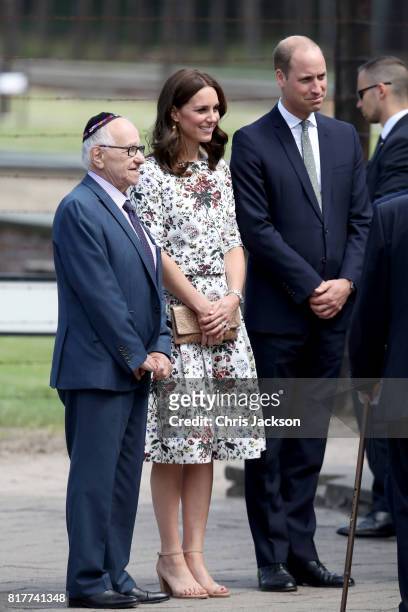 Prince William, Duke of Cambridge and Catherine, Duchess of Cambridge talk with former prisoners from the Stutthof concentration camp during an...