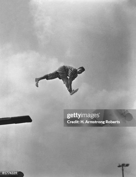 clown on diving board. (photo by h. armstrong roberts/retrofile/getty images) - retrofile foto e immagini stock