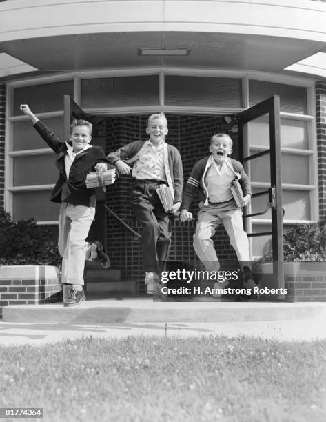 three excited boys running out of school. (photo by h. armstrong roberts/retrofile/getty images) - retrofile foto e immagini stock