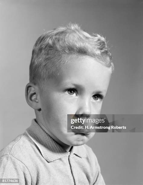 blonde boy pouting, sticking out his lower lip, ready to cry. - 1950 1960 stock pictures, royalty-free photos & images