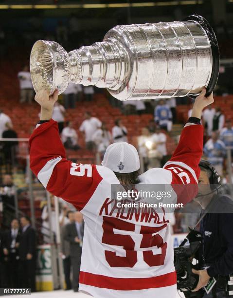 Niklas Kronwall of the Detroit Red Wings celebrates with the Stanley Cup after defeating the Pittsburgh Penguins in game six of the 2008 NHL Stanley...