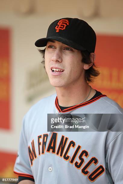 Tim Lincecum of the San Francisco Giants gets ready in the dugout before the game against the Oakland Athletics at the McAfee Coliseum in Oakland,...