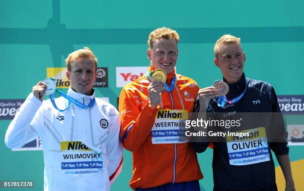 1st place, Ferry Weertman of the Netherlands 2nd place, Jordan Wilimovsky of The United States and 3rd place Marc-Antoine Oliver of France celebrate...