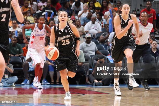 Becky Hammon of the San Antonio Silver Stars pushes the ball upcourt against the Atlanta Dream during the WNBA game on June 18, 2008 at Philips Arena...