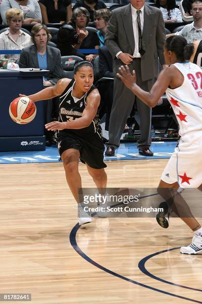Helen Darling of the San Antonio Silver Stars drives against Stacey Lovelace of the Atlanta Dream during the WNBA game on June 18, 2008 at Philips...