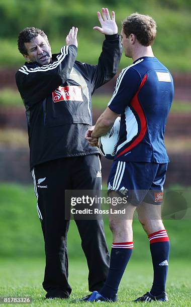 Back line coach Wayne Smith talks with Andy Ellis during a New Zealand All Black training session at Rugby League Park on July 1, 2008 Wellington,...