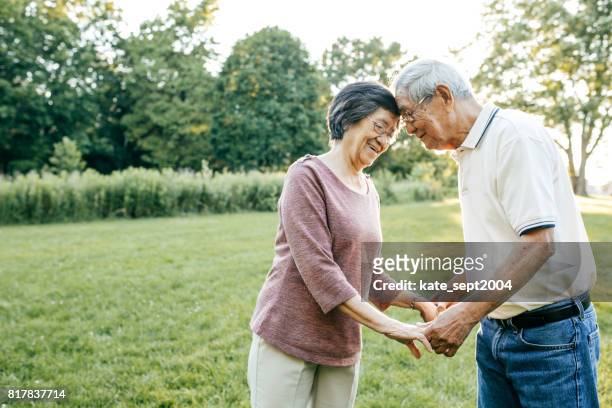 50 years together - asian wife stock pictures, royalty-free photos & images