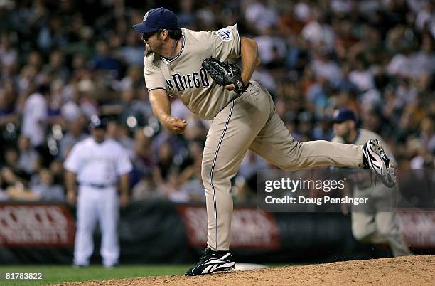 Pitcher Heath Bell of the San Diego Padres follows through as he delivers against the Colorado Rockies at Coors Field on June 30, 2008 in Denver,...