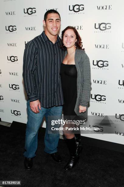Josh Mauga and Amanda Gross attend UGG Australia and VOGUE Celebrate Madison Avenue Opening at UGG Australia on October 28, 2010 in New York City.
