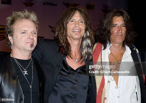 Joey Kramer, Steven Tyler and Joe Perry attend the launch of Guitar Hero Aerosmith at the Hard Rock Cafe on June 27, 2008 in New York City.